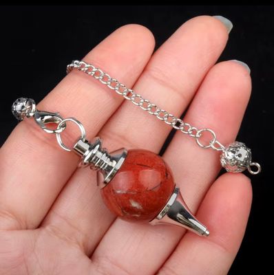 Crystal Pendulum Red jasper Sphere with internal  copper core.